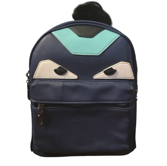 Chic Navy Faux-Leather Mini Backpack with Playful Face Detail - Picture 3 of 15